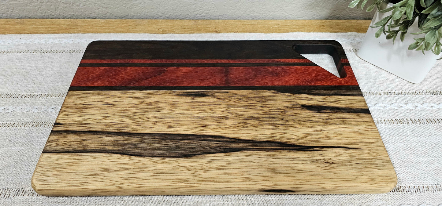 Cutting Board With Handle | Peruvian Walnut, African Padauk, & Black Limba Woods