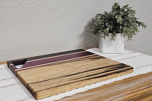 Cutting Board With Handle | Peruvian Walnut, Purpleheart, African Sapele, & Black Limba Woods